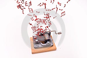 Music notes flying out of music box